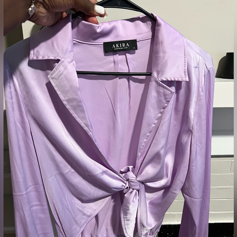 Lavender body suit size XL , tried on at store and purchased to wear, never wore